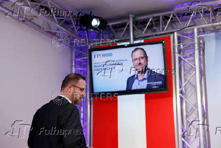 Far-right Freedom Party's co-Secretary-General Christian Hafenecker speaks to reporters