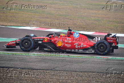 Lewis Hamilton drives a Ferrari F1 car around the Fiorano circuit as part of the TPC tests.