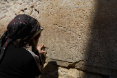 Jewish worshippers pray at the Western Wall in the Old City of Jerusalem