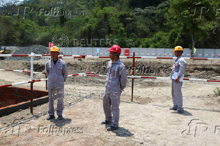Visit to the construction site of a new water purification plant, financed by China, in Santiago Texacuangos