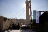 Rebel fighters outside Umayyad Mosque in Aleppo