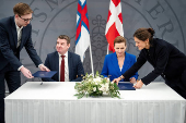 Denmark's Prime Minister Mette Frederiksen and the Faroese Prime Minister Aksel V. Johannesen sign a joint request to the Danish Supreme Court, in Prime Minister's Office, in Copenhagen