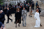 Guests arrive at Schiaparelli Haute Couture Spring/Summer 2025 show in Paris