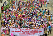 People take part in a rally organised by the Coordinating Committee on Manipur Integrity (COCOMI) in Imphal, Manipur