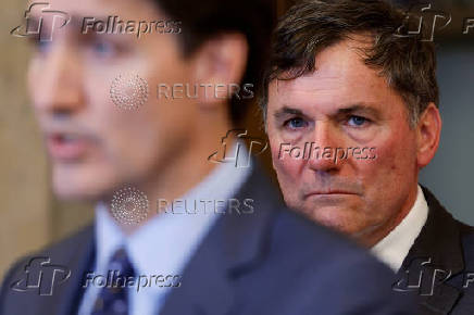 Canada's Canada's Minister of Public Safety, Democratic Institutions and Intergovernmental Affairs Dominic LeBlanc and Prime Minister Justin Trudeau take part in a press conference on Parliament Hill in Ottawa