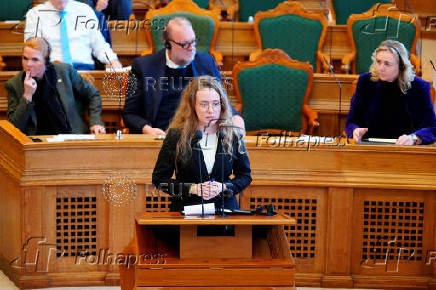 Greenlandic politician Aki-Matilda Hoeegh-Dam speaks in her native language, Greenlandic, as the Danish Parliament, for the first time, allows simultaneous interpretation during debates, in Copenhagen