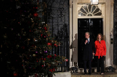 British Prime Minister Starmer and his wife switch on the Downing Street Christmas tree lights, in London