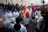 The Latin Patriarch of Jerusalem, Pierbattista Pizzaballa, leads a mass at the Church of Nativity in the Old City of Bethlehem