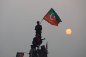 Supporters of jailed former Pakistani Prime Minister Imran Khan attend a rally in Swabi