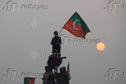 Supporters of jailed former Pakistani Prime Minister Imran Khan attend a rally in Swabi