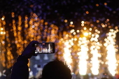 Paris Olympics chief Estanguet turns on Christmas lights on the Champs Elysees