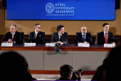 Nobel laureates in economics Simon Johnson, James A. Robinson, Nobel laureates in chemistry David Baker, Demis Hassabis, John Jumper sit during a press conference, in Stockholm