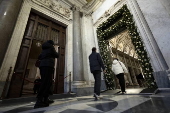 People walk through the Holy Door at Rome's Basilica of Saint Mary Major