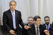 Joaquim Levy e Marcos Montes durante almoo com parlamentares