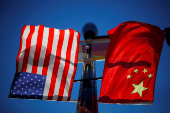 FILE PHOTO: FILE PHOTO: The flags of the United States and China fly in Boston