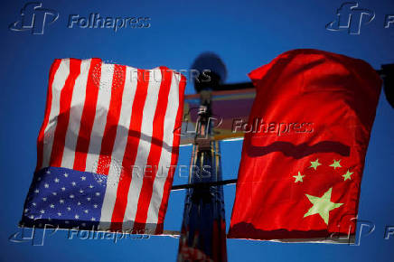 FILE PHOTO: FILE PHOTO: The flags of the United States and China fly in Boston