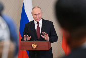 Russian President Putin attends a press conference in Astana