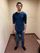 Luigi Mangione, 26, a suspect in the New York City killing of UnitedHealth executive Brian Thompson, stands in a cell in Altoona