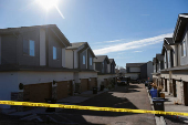 Investigators search a townhouse, in relation to the explosion in Las Vegas of a Tesla Cybertruck