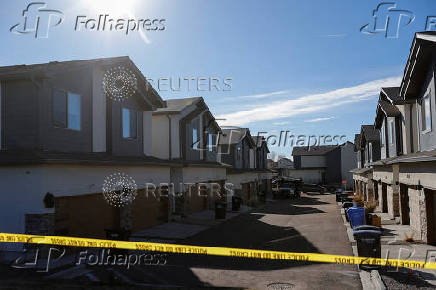 Investigators search a townhouse, in relation to the explosion in Las Vegas of a Tesla Cybertruck