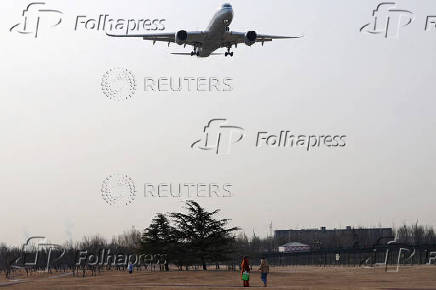 FILE PHOTO: Spring Festival travel rush at Beijing Capital International Airport