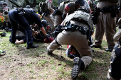 Law enforcement face off against pro-Palestinian protesters at the University of Texas