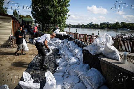 People take preventive measures for the flooding of the Danube, in Budapest