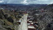 Drone picture shows flooded buildings in the aftermath of landslides caused by intense rains and illegal earth movements, in the Inca Llojeta area