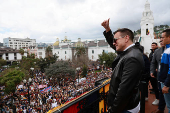 Ecuador's President Daniel Noboa greets supporters of his government, at the Government Palace in Quito