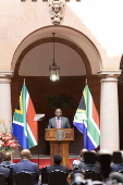 South Africa President Cyril Ramaphosa signs the National Health Insurance Bill into law
