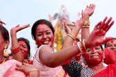 Immersion of idols on the last day of Durga Puja festival in India