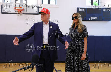 Republican presidential nominee former U.S. President Donald Trump votes on Election Day in Palm Beach