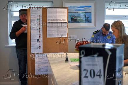 People vote in Ireland's general election, on the island of Gola