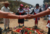 Members of Indigenous communities participate in a rain petition rituals with songs and offering, in the archaeological site of Cuicuilco