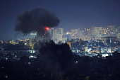 Smoke billows over Beirut's southern suburbs, after an Israeli strike