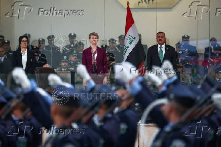 Britain's Home Secretary Yvette Cooper meets Iraq's Minister of Interior Abdul Amir Al-Shammari, in Baghdad