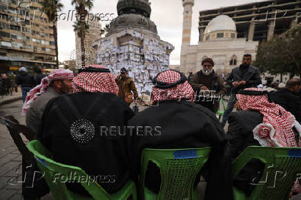 People looking for missing relatives in Damascus