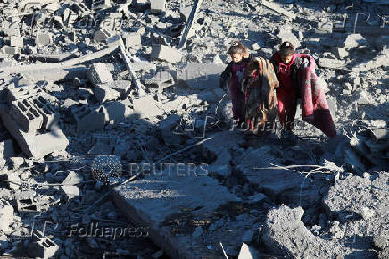 Site of an Israeli strike on a house, amid the Israel-Hamas conflict, in Al Maghazi refugee camp in the central Gaza Strip