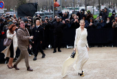 Guests arrive at Schiaparelli Haute Couture Spring/Summer 2025 show in Paris