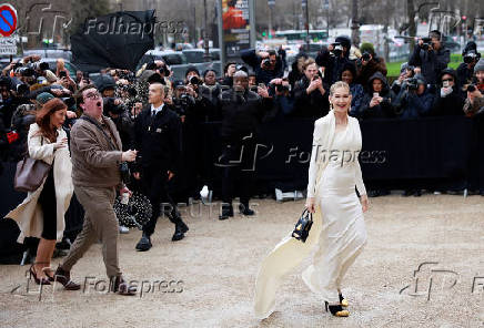 Guests arrive at Schiaparelli Haute Couture Spring/Summer 2025 show in Paris