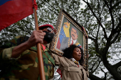 Government supporters participate in a march in support of Venezuelan President Nicolas Maduro?s victory in the July 28 elections, in Caracas