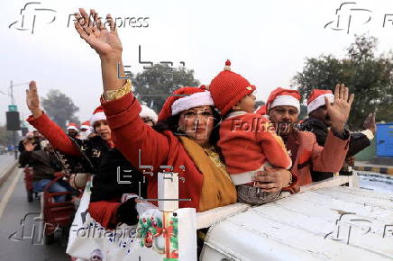 Pakistan's Christian minority dressed up as Santa hold rally in Peshawar