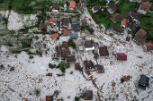 A drone view shows a flooded residential area in Donja Jablanica