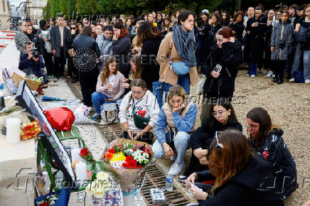 Fans gather and place tributes to former One Direction singer Liam Payne in Paris