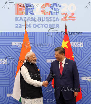 Chinese President Xi and Indian Prime Minister Modi meet in Kazan