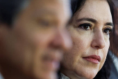 Brazil's Planning Minister Simone Tebet looks on as she attends a press conference along with Finance Minister Fernando Haddad, at the Planalto Palace in Brasilia