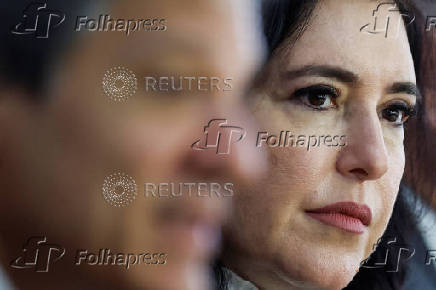 Brazil's Planning Minister Simone Tebet looks on as she attends a press conference along with Finance Minister Fernando Haddad, at the Planalto Palace in Brasilia