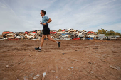 Flood-affected residents share opposite views on the Valencia marathon