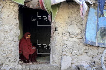 Afghans living in a camp amidst drop in temperatures in Kabul