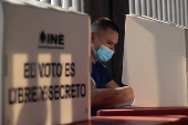 Inmates vote during early voting for people in preventive detention, in Tlalnepantla